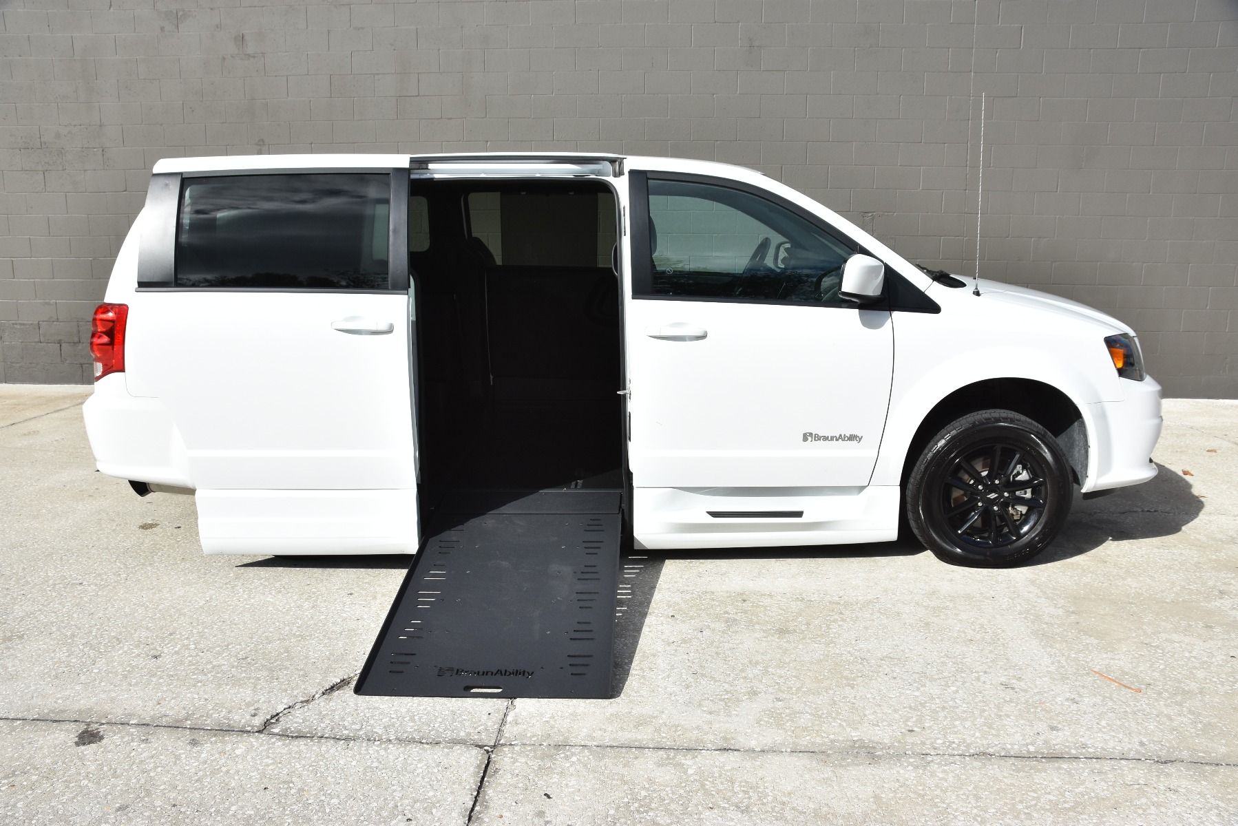 White 2020 Dodge Grand Caravan Wheelchair Van with ramp deployed