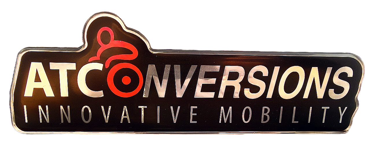 The letters ATC with wings on either side, inside an oval. To the right are the words Innovative Mobility Solutions. Silver letters on a black background.