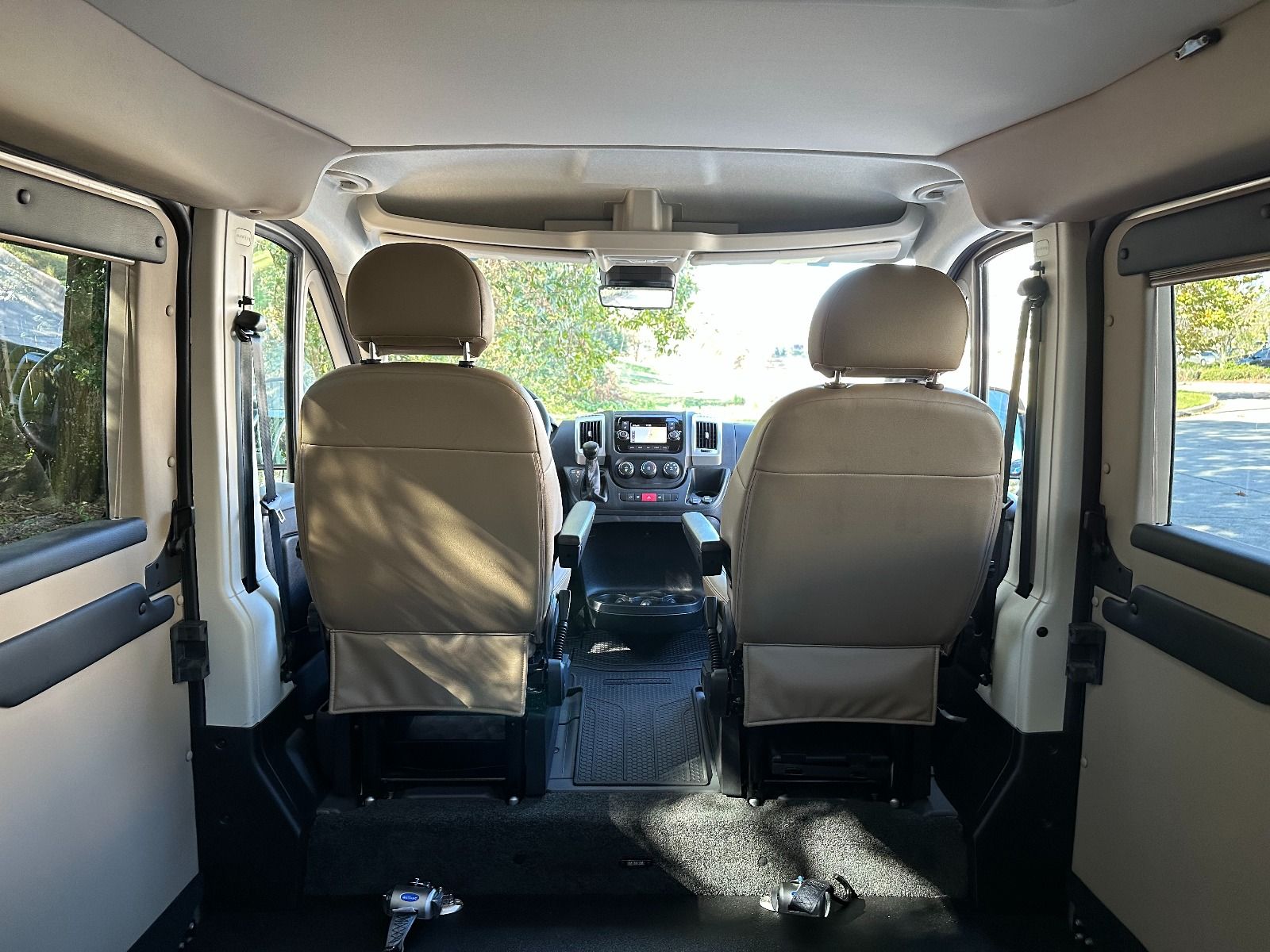 Interior of RAM ProMaster with Tempest X Wheelchair Van Conversion Interior and back of front seats of RAM ProMaster with Tempest X Wheelchair Van Conversion