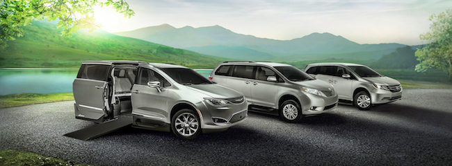 Chrysler, Toyota, and Honda Wheelchair Vans A Chrysler, Toyota, and Honda wheelchair van parked side by side. All are silver in color.